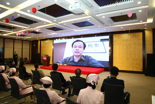 6北京市委宣傳部精神文明宣教處處長章力丁通過視頻發(fā)來祝賀.jpg